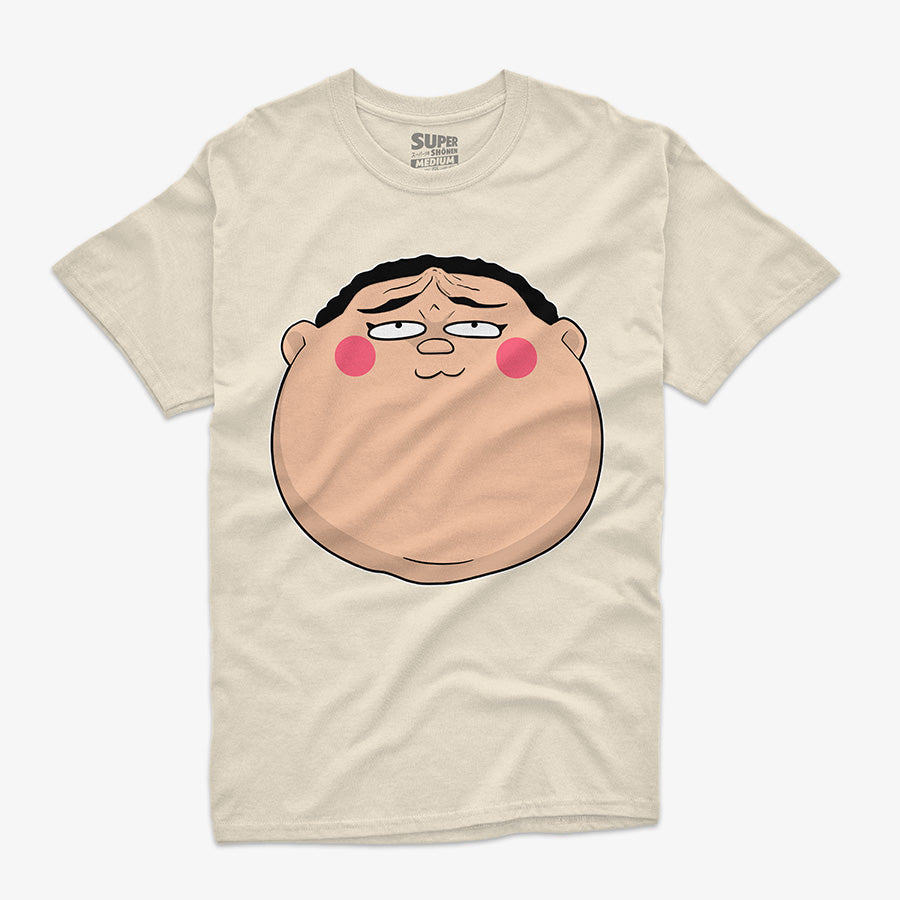 Polera color arena con una gran ilustracion de la cara del personaje de anime Koni-Chan con una expresion chistosa. El diseno se centra en la parte frontal de la polera