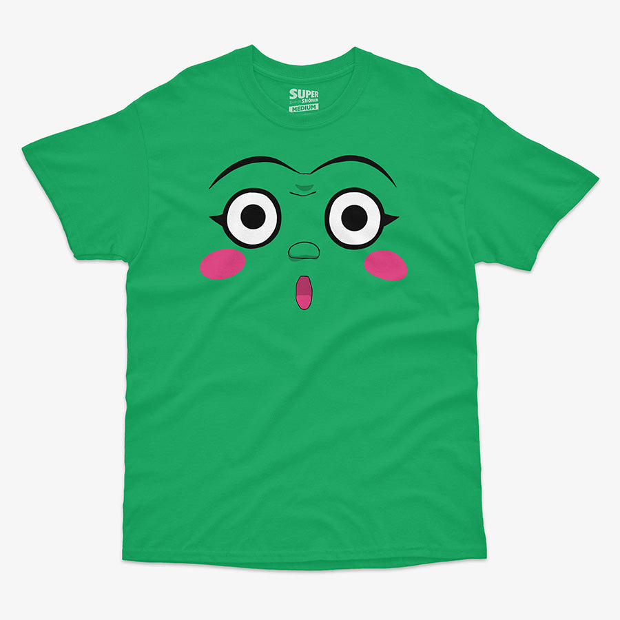 Polera verde de Dotto! Koni-chan. Diseno central de la cara de Koni-chan con grandes ojos blancos, rubor rosado en las mejillas y una boca pequena y abierta, con fondo verde