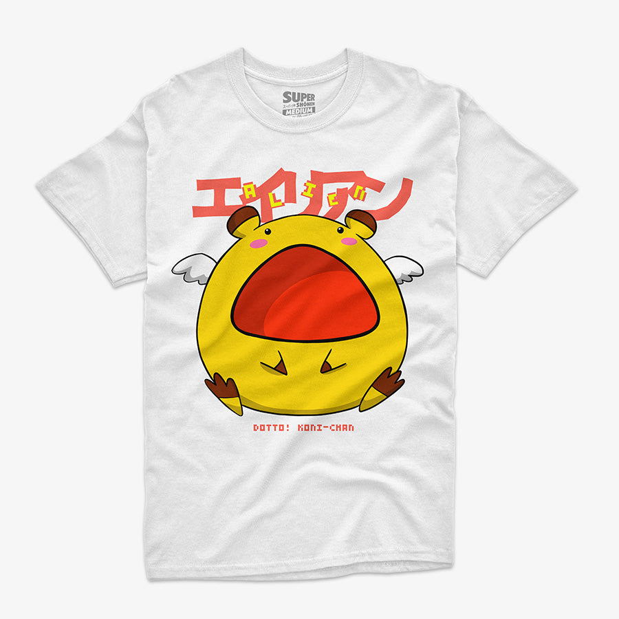 Polera blanca de Dotto! Koni-chan con una ilustracion central de un alien redondo amarillo con alas blancas, boca roja abierta y ojos pequenos. Arriba tiene texto en japones en rojo y abajo 'DOTTO! KONI-CHAN'