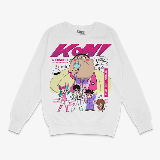 Polerón blanco de Koni-Chan con una gran ilustracion del personaje principal cantando en un microfono, acompañado por nari, moro, high y afro. El texto 'KONI IN CONCERT' es visible. Diseño frontal.
